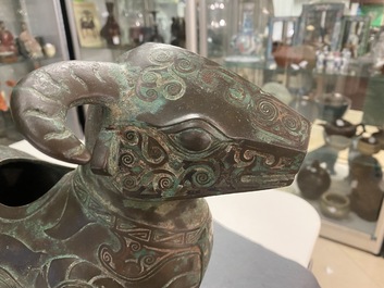 A Chinese ram-shaped silver-inlaid bronze 'xizun' vessel, Ming