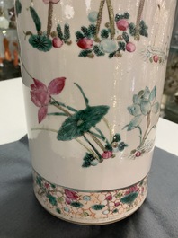 A Chinese famille rose rouleau vase with butterflies and cranes near a lotus pond, 19th C.