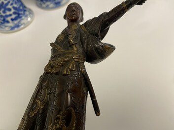 A Japanese patinated and gilded bronze figure of a warrior, signed Miyao, Meiji, 19th C.