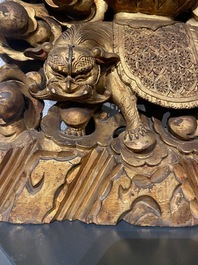 A large Chinese gilded and lacquered wooden reticulated Buddhist shrine, 17/18th C.