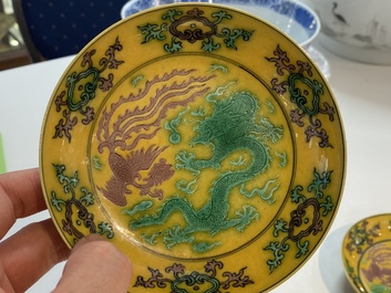 A pair of Chinese yellow-ground turquoise- and aubergine-glazed 'dragon and phoenix' plates, Qianlong mark, 19/20th C.