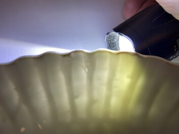 A Chinese blue and white chysanthemum-moulded ko-sometsuke 'tiger' dish for the Japanese market, Tianqi/Chongzhen