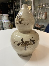 A Chinese Cizhou double gourd vase, Song/Yuan