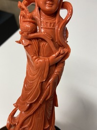 A Chinese carved red coral 'Guanyin' figure, 19/20th C.