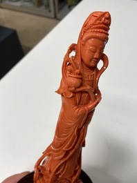 A Chinese carved red coral 'Guanyin' figure, 19/20th C.