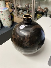 A Chinese black-brown-glazed russet-splashed jar, Henan kilns, Song