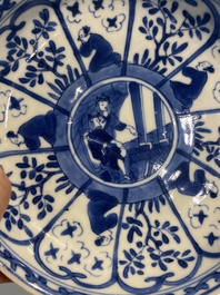 A Chinese blue and white covered cup and saucer for the French market, Kangxi