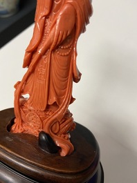 A Chinese carved red coral 'Guanyin' figure, 19/20th C.