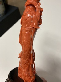 A Chinese carved red coral 'Guanyin' figure, 19/20th C.