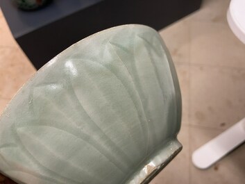 Three Chinese celadon-glazed 'lotus' bowls, Song