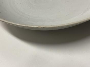 A Chinese monochrome white dish with incised double phoenix design, Jiajing mark, Ming