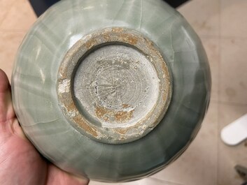 Three Chinese celadon-glazed 'lotus' bowls, Song