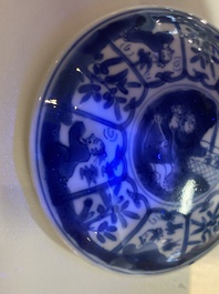 A Chinese blue and white covered cup and saucer for the French market, Kangxi