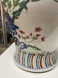 Un vase en porcelaine de Chine famille rose &agrave; d&eacute;cor d'oiseaux parmi des branches fleuries, Qianlong