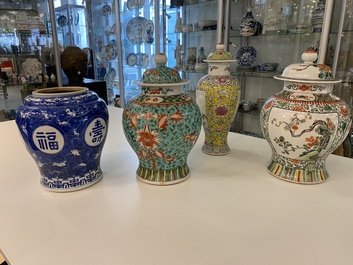 Four various Chinese famille rose, verte and blue and white vases, 19/20th C.