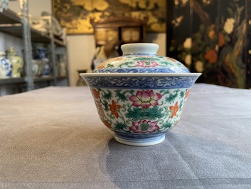 A Chinese famille rose bowl and cover, a 'dragon' plate and a celadon plate, 19th C.