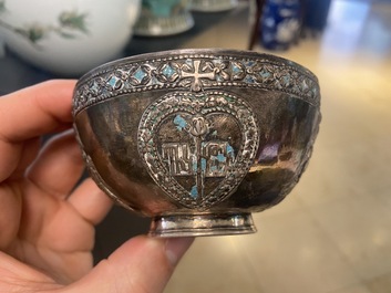 An Armenian enamelled silver cup and saucer, 18th C.