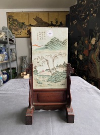 A Chinese famille rose dish and a qianjiang cai plaque signed Wang Ziqing mounted as a screen, Yongzheng and Republic