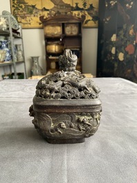 A Chinese bronze 'mythical beasts' censer and cover, 17th C.