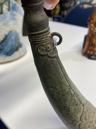 A Vietnamese bronze 'Oliphant' horn or rhyton, L&ecirc; or Mạc dynasty, 15/16th C.