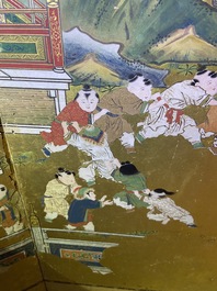 A Japanese painted six-panel 'Byobu' folding screen with playing boys, Edo, 18/19th C.