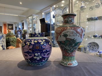 A Chinese famille verte 'mythical animals' vase and a famille rose jar and cover with dragons, 19/20th C.