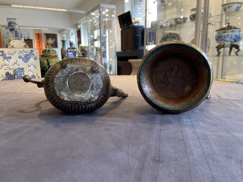 A Tibetan brass ewer, an alms bowl and an Indian bronze ewer, 18/19th C.