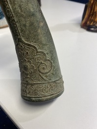 A Vietnamese bronze 'Oliphant' horn or rhyton, L&ecirc; or Mạc dynasty, 15/16th C.