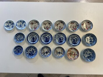 Twenty-two Chinese blue and white and famille rose cups and nineteen saucers, Kangxi and later