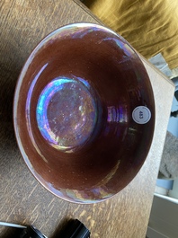 A Chinese aubergine-glazed bowl with incised design of cranes, Kangxi