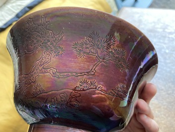 A Chinese aubergine-glazed bowl with incised design of cranes, Kangxi