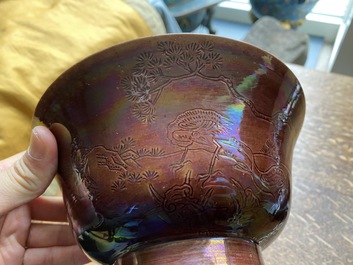 A Chinese aubergine-glazed bowl with incised design of cranes, Kangxi