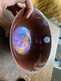 A Chinese aubergine-glazed bowl with incised design of cranes, Kangxi