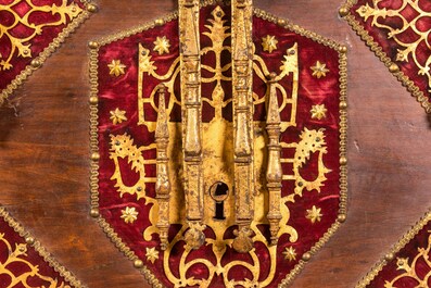 A Spanish walnut 'bargue&ntilde;o' cabinet with red velvet and bronze mounts, 17th C.