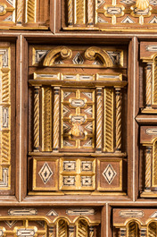 A Spanish walnut 'bargue&ntilde;o' cabinet with red velvet and bronze mounts, 17th C.