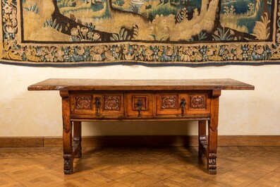 A Spanish walnut table with three drawers, 17th C.