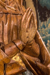 Two large Flemish polychromed and gilt walnut figures of Mary and John the Baptist, Brabant, late 15th C.