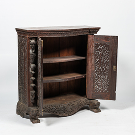 An Anglo-Indian colonial carved wooden two-door cabinet, 19th C.