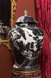 A pair of large black and white 'Grand Antique' marble vases and covers, probably Italy, 19/20th C.