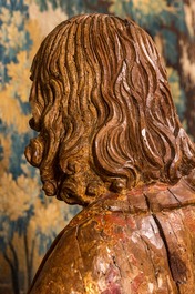 Two large Flemish polychromed and gilt walnut figures of Mary and John the Baptist, Brabant, late 15th C.