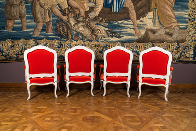 A partly gilt wooden sofa and four armchairs with red velvet upholstery, 18/19th C.