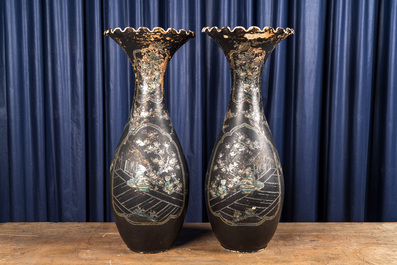 A pair of large mother-of-pearl-inlaid black-lacquered Japanese vases with fan-shaped rims, Meiji, 19th C.