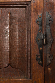 A Flemish Gothic oak two-door cabinet with linenfold panels, 19th C. with older elements