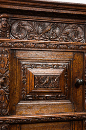 A finely sculpted Flemish oak four-door cabinet, late 17th C.