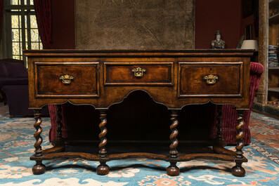 An English walnut sideboard with three drawers, 19th C.