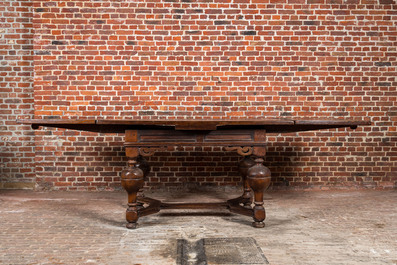 A Dutch extendable wooden table, 17th C.