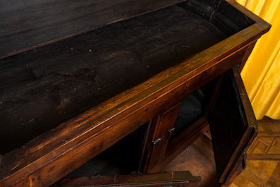 A wooden Gothic Revival buffet with older elements and wrought iron mounts, 19th C.