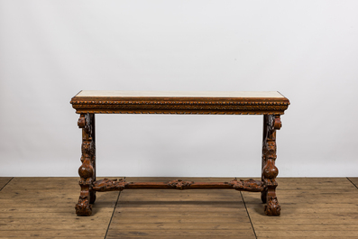 A patinated wooden wall console with marble top, probably Italy, 19th C.