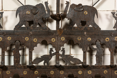 An Indian wrought iron hanging oil lamp with animals, 20th C.