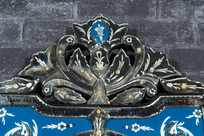 A Venetian blue ground mirror with floral design, 20th C.
